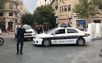 Illustrative: Police squad cars in Zion Square, downtown Jerusalem, September 20, 2017. (Stuart Winer/ Times of Israel)