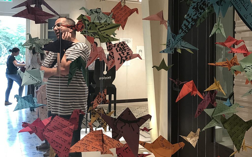 Curator Yuval Saar at an Illustration Week exhibit Grace Austin/Times of Israel) Curator Yuval Saar at an Illustration Week exhibit Grace Austin/Times of Israel)