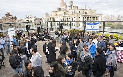 Illustrative: Participants in a past Shavuot program at JCC Manhattan gather on the JCC’s roof. (Courtesy of JCC Manhattan)