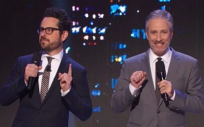 Star Wars filmmaker J.J. Abrams (left) offers to leak the plot of the ninth episode to the highest donor for HBO's autism benefit, 'Night of Too Many Stars,' hosted by Jon Stewart on November 18, 2017. (YouTube screenshot)