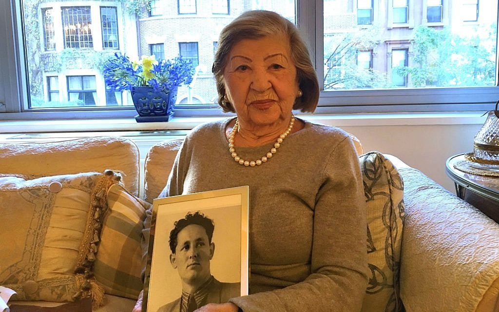 Rose Holm at her apartment holding a photo of her late husband, Joe, October 31, 2017. (Josefin Dolsten/JTA) Rose Holm at her apartment holding a photo of her late husband, Joe, October 31, 2017. (Josefin Dolsten/JTA)