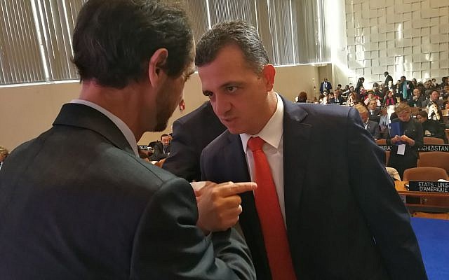 Israeli Ambassador to UNESCO Carmel Hacohen Shama, right, argues with a Palestinian diplomat during the agency's General Conference in Paris, November 2017 (courtesy) Israeli Ambassador to UNESCO Carmel Hacohen Shama, right, argues with a Palestinian diplomat during the agency's General Conference in Paris, November 2017 (courtesy)