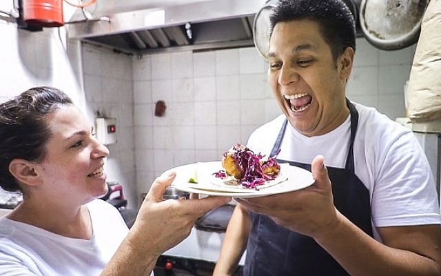 Yittie Lawson (left) and Luis Cruz test-drive their homemade tacos for Tacos Luis, the Jerusalem taqueria they're crowdfunding through a Kickstarter campaign (Courtesy Yittie Lawson) Yittie Lawson (left) and Luis Cruz test-drive their homemade tacos for Tacos Luis, the Jerusalem taqueria they're crowdfunding through a Kickstarter campaign (Courtesy Yittie Lawson)