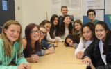 The members of the Brandeis School’s 2017-18 seventh-grade class said they appreciated hearing from a range of nonprofits in their city. (Ben Sales/JTA)