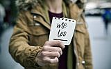 Illustrative image of a victim of sexual harassment holding a note with the text 'me too.' (nito100/iStock by Getty Images)