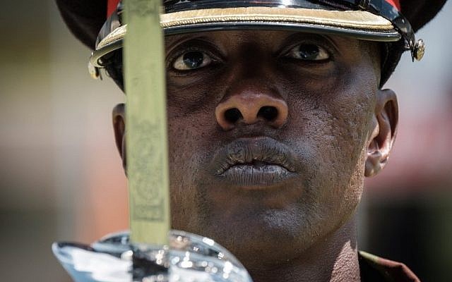 A Kenyan army soldier performs during the rehearsal of the inauguration ceremony of the president at the Moi International Sports Center's Kasarani Stadium in Nairobi on November 27, 2017. (AFP PHOTO / YASUYOSHI CHIBA) A Kenyan army soldier performs during the rehearsal of the inauguration ceremony of the president at the Moi International Sports Center's Kasarani Stadium in Nairobi on November 27, 2017. (AFP PHOTO / YASUYOSHI CHIBA)
