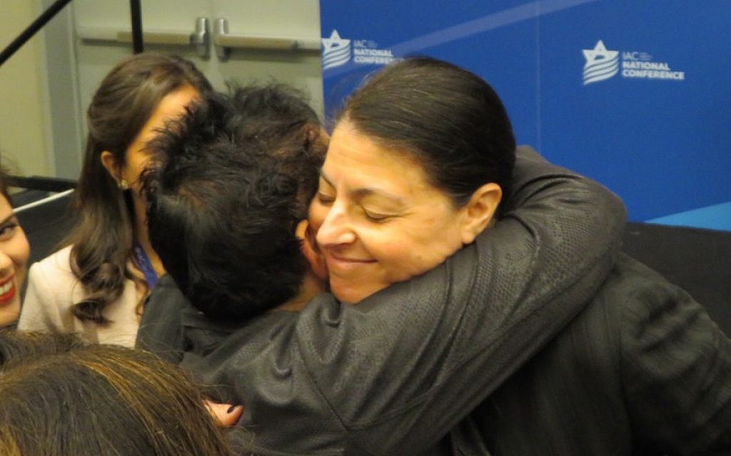 Zionist Union MK Merav Michaeli embraces a participant at the Israeli American Council’s annual Washington conference, on Nov. 5, 2017. (Ron Kampeas/JTA) Zionist Union MK Merav Michaeli embraces a participant at the Israeli American Council’s annual Washington conference, on Nov. 5, 2017. (Ron Kampeas/JTA)