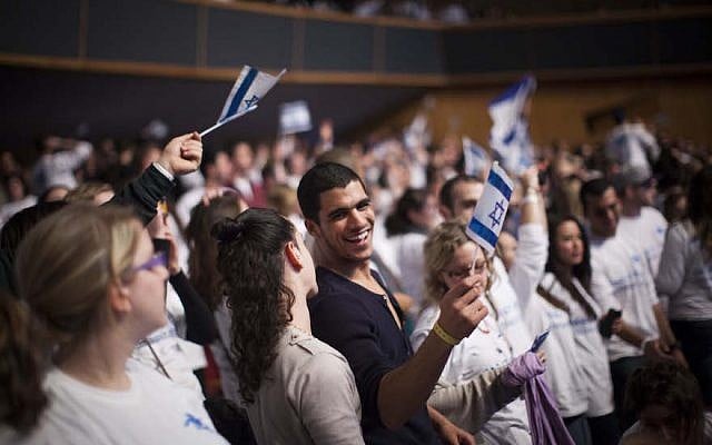 Young Jewish adults from all over the world participating in the Taglit Birthright program celebrate 10 years of the Birthright program at an event held at the International Conference Center in Jerusalem on January 7, 2013. (Yonatan Sindel/Flash90) Young Jewish adults from all over the world participating in the Taglit Birthright program celebrate 10 years of the Birthright program at an event held at the International Conference Center in Jerusalem on January 7, 2013. (Yonatan Sindel/Flash90)