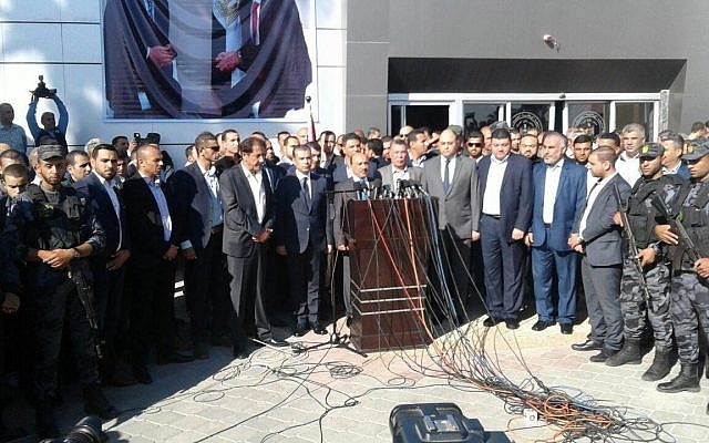 Hamas and Fatah officials attend ceremony in which the Gaza terror group handed over all Gaza border crossing to the Palestinian Authority on November 1, 2017/ (Wafa) Hamas and Fatah officials attend ceremony in which the Gaza terror group handed over all Gaza border crossing to the Palestinian Authority on November 1, 2017/ (Wafa)
