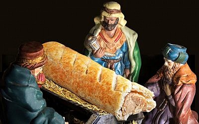 An advert for UK bakery chain Greggs showing the Three Wise Men worshiping a sausage roll. (Taylor Herring/Greggs/PA)