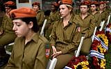 Female soldiers participate in an official ceremony marking Israel's Memorial Day, one day ahead of Israel's 69'th Indepedence Day in Kiryat Shaul military cemetery, Tel Aviv, on May 1, 2017. (Gili Yaari/Flash90)