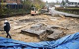 The giant swastika-shaped base of a Nazi-era statue  discovered on a construction site for a sports field in Hamburg, northern Germany, November 21, 2017. (Christian Charisius/dpa via AP)