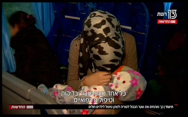 Syrian medical patients in Israel, seen in a TV report broadcast on November 19, 2017 (Hadashot News screenshot)