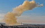 A picture taken on November 28, 2017 from Rafah in the southern Gaza Strip shows smoke billowing following an explosion close to the border on the Egyptian side of the divided city.
(AFP/SAID KHATIB)