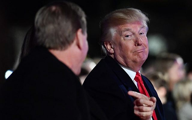 US President Donald Trump (R) speaks with US Interior Secretary Ryan Zinke during the 95th annual National Christmas Tree Lighting ceremony near the White House on November 30, 2017. (AFP Photo/Nicholas Kamm) US President Donald Trump (R) speaks with US Interior Secretary Ryan Zinke during the 95th annual National Christmas Tree Lighting ceremony near the White House on November 30, 2017. (AFP Photo/Nicholas Kamm)