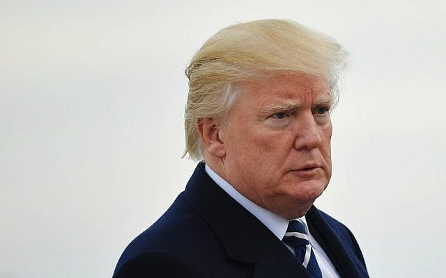 US President Donald Trump makes his way to board Air Force One before departing from John F. Kennedy International Airport in New York, New York, on December 2, 2017. (AFP Photo/Mandel Ngan) US President Donald Trump makes his way to board Air Force One before departing from John F. Kennedy International Airport in New York, New York, on December 2, 2017. (AFP Photo/Mandel Ngan)