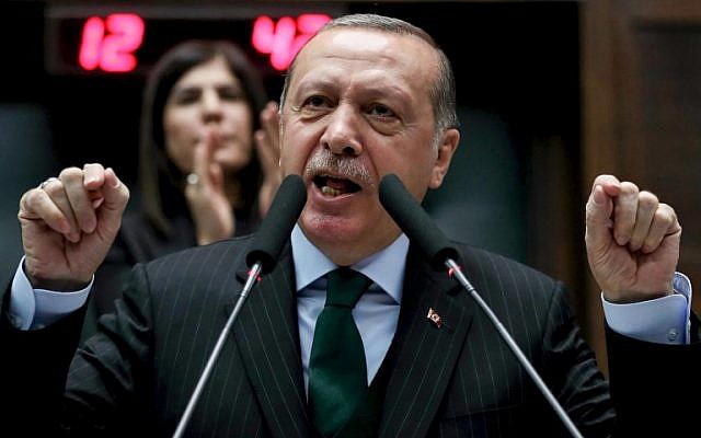President of Turkey Recep Tayyip Erdogan, gestures as he gives a speech at the Grand National Assembly of Turkey in Ankara, on December 5, 2017. (AFP Photo/Adem Altan) President of Turkey Recep Tayyip Erdogan, gestures as he gives a speech at the Grand National Assembly of Turkey in Ankara, on December 5, 2017. (AFP Photo/Adem Altan)