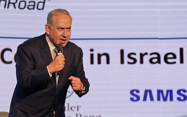 Prime Minister Benjamin Netanyahu delivers a speech on December 6, 2017, during a diplomatic conference organized by The Jerusalem Post on Israel's security and economic ties (AFP PHOTO / MENAHEM KAHANA) Prime Minister Benjamin Netanyahu delivers a speech on December 6, 2017, during a diplomatic conference organized by The Jerusalem Post on Israel's security and economic ties (AFP PHOTO / MENAHEM KAHANA)