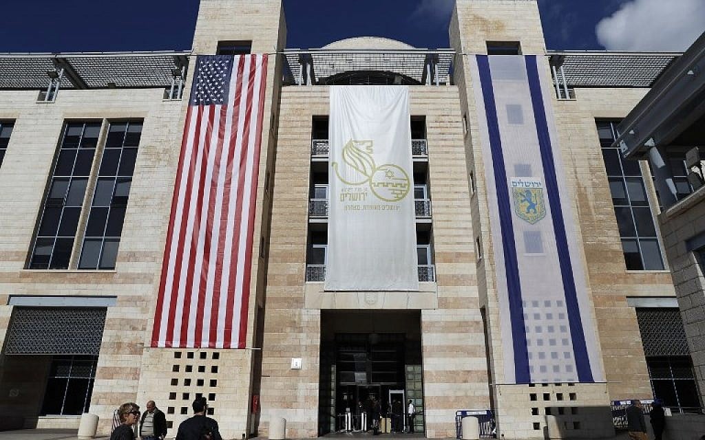 The US and Israeli flags hang at the entrance of Jerusalem Municipality building following US President Donald Trump's decision to recognize the city as the capital of Israel on December 7, 2017. (Ahmad GHARABLI/AFP)