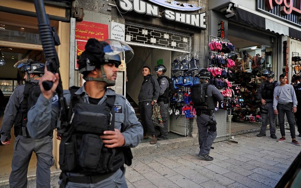 Israeli security forces detain a Palestinian protester on December 9, 2017, in East Jerusalem. (AFP/Ahmad Gharabli) Israeli security forces detain a Palestinian protester on December 9, 2017, in East Jerusalem. (AFP/Ahmad Gharabli)