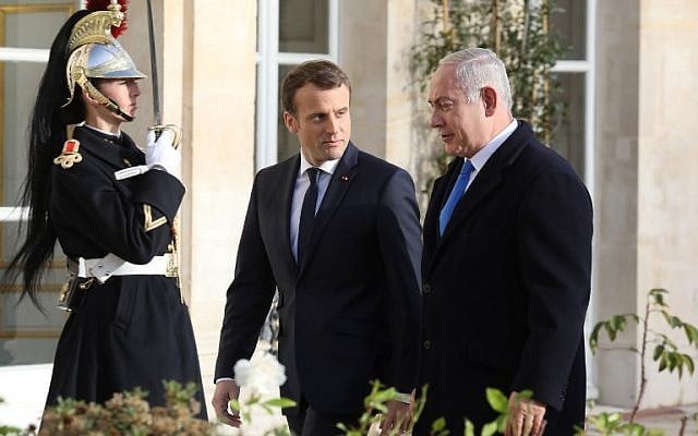 French President Emmanuel Macron (L) welcomes Prime Minister Benjamin Netanyahu upon his arrival at the Elysee Palace on December 10, 2017 in Paris. (AFP/Ludovic Marin) French President Emmanuel Macron (L) welcomes Prime Minister Benjamin Netanyahu upon his arrival at the Elysee Palace on December 10, 2017 in Paris. (AFP/Ludovic Marin)