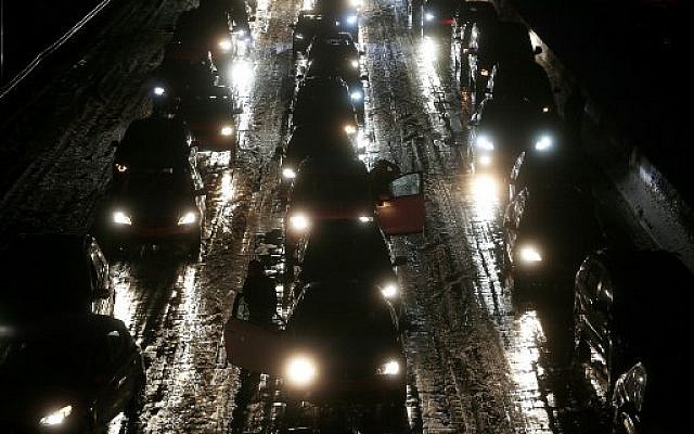 After heavy snowfall, traffic stands almost still on motorway A3 towards north, on December 10, 2017, near Duesseldorf, western Germany. (AFP Photo/dpa/David Young/Germany OUT) After heavy snowfall, traffic stands almost still on motorway A3 towards north, on December 10, 2017, near Duesseldorf, western Germany. (AFP Photo/dpa/David Young/Germany OUT)