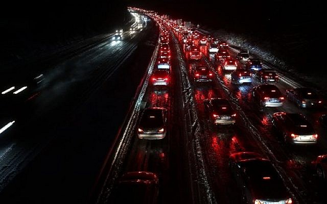 After heavy snowfall, traffic stands almost still on motorway A3 towards north, on December 10, 2017, near Duesseldorf, western Germany. (AFP Photo/dpa/David Young/Germany OUT) After heavy snowfall, traffic stands almost still on motorway A3 towards north, on December 10, 2017, near Duesseldorf, western Germany. (AFP Photo/dpa/David Young/Germany OUT)