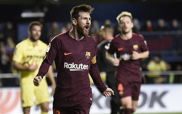 Barcelona forward Lionel Messi celebrates after scoring during the Spanish league football match between Villarreal CF and FC Barcelona at La Ceramica stadium in Vila-real on December 10, 2017. (AFP / JOSE JORDAN) Barcelona forward Lionel Messi celebrates after scoring during the Spanish league football match between Villarreal CF and FC Barcelona at La Ceramica stadium in Vila-real on December 10, 2017. (AFP / JOSE JORDAN)