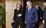 EU foreign policy chief Federica Mogherini speaks with Prime Minister Benjamin Netanyahu as he arrives for their meeting at the European Council in Brussels on December 11, 2017. (AFP Photo/Pool/Eric Vidal)