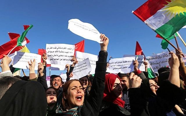 Iraqi Kurdish students from Salahaddin University wave the Kurdish flag as they demonstrate in Arbil, the capital of the autonomous Iraqi Kurdistan region, on December 11, 2017, against the Iraqi prime minister. (AFP Photo/Safin Hamed) Iraqi Kurdish students from Salahaddin University wave the Kurdish flag as they demonstrate in Arbil, the capital of the autonomous Iraqi Kurdistan region, on December 11, 2017, against the Iraqi prime minister. (AFP Photo/Safin Hamed)