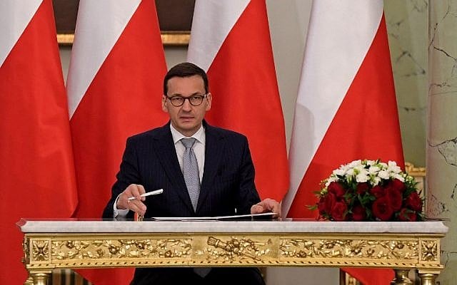 Mateusz Morawiecki signs a document confirming him as Poland's new prime minister at the presidential palace in Warsaw on December 11, 2017. (AFP Photo/Janek Skarzynski) Mateusz Morawiecki signs a document confirming him as Poland's new prime minister at the presidential palace in Warsaw on December 11, 2017. (AFP Photo/Janek Skarzynski)