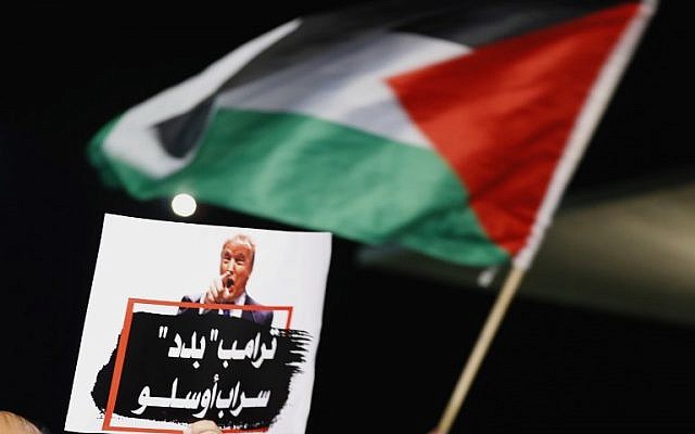 Arab Israelis take part in a protest outside the American embassy in Tel Aviv against US President Donald Trump's decision to recognize Jerusalem as Israel's capital on December 12, 2017. (AFP Photo/Jack Guez)