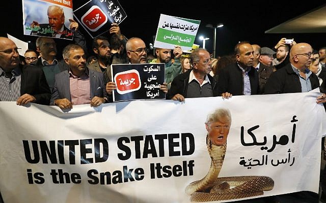 Arab Israelis take part in a protest outside the American embassy in Tel Aviv against US President Donald Trump's decision to recognize Jerusalem as Israel's capital on December 12, 2017. (AFP Photo/Jack Guez)