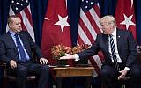 This file photo taken on September 21, 2017 shows US President Donald Trump reaching to shake Turkey's President Recep Tayyip Erdogan's hand before a meeting at the Palace Hotel during the 72nd United Nations General Assembly in New York City. (AFP PHOTO / Brendan Smialowski)