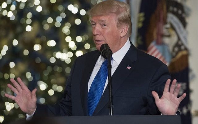 US President Donald Trump speaks about tax reform legislation in the Grand Foyer of the White House in Washington, DC, December 13, 2017. (AFP/Saul Loeb) US President Donald Trump speaks about tax reform legislation in the Grand Foyer of the White House in Washington, DC, December 13, 2017. (AFP/Saul Loeb)