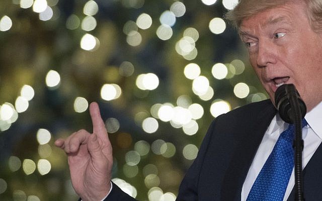 US President Donald Trump speaks about tax reform legislation in the Grand Foyer of the White House in Washington, DC, December 13, 2017. (AFP PHOTO / SAUL LOEB) US President Donald Trump speaks about tax reform legislation in the Grand Foyer of the White House in Washington, DC, December 13, 2017. (AFP PHOTO / SAUL LOEB)