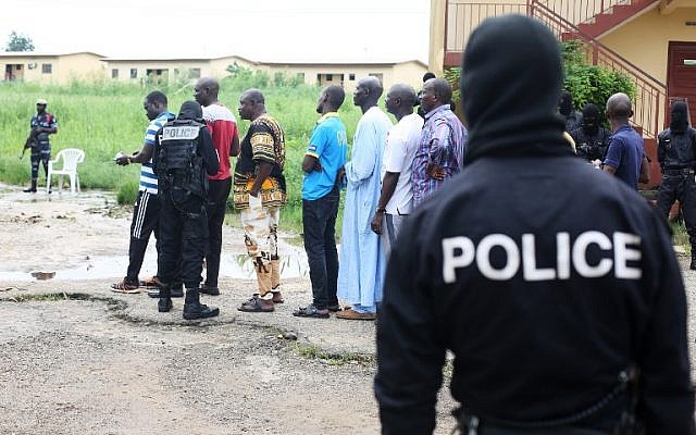 Police question detained Muslim retail traders on December 17, 2017 in Libreville, following a knife attack on two Danish nationals. (AFP PHOTO / Steve JORDAN) Police question detained Muslim retail traders on December 17, 2017 in Libreville, following a knife attack on two Danish nationals. (AFP PHOTO / Steve JORDAN)