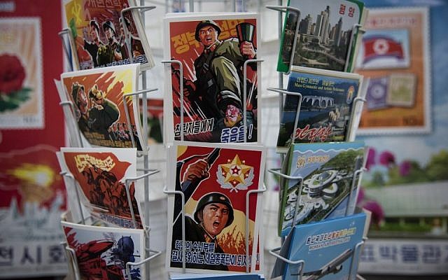 In a photo taken on November 15, 2017, military-themed postcards are displayed at a shop in central Pyongyang. (AFP PHOTO / Ed JONES) In a photo taken on November 15, 2017, military-themed postcards are displayed at a shop in central Pyongyang. (AFP PHOTO / Ed JONES)