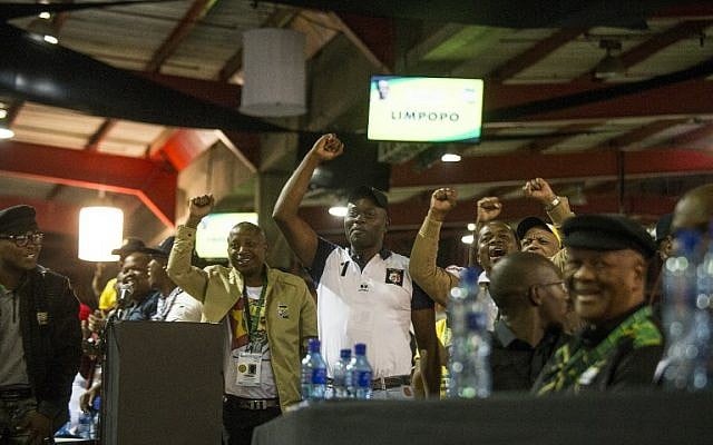 African National Congress delegates cheer the closing speech of newly elected African National Congress (ANC) President, Cyril Rampahosa, on the final day of the 54th ANC conference at the NASREC Expo Centre in Johannesburg, December 20, 2017. (AFP/Wikus De Wet) African National Congress delegates cheer the closing speech of newly elected African National Congress (ANC) President, Cyril Rampahosa, on the final day of the 54th ANC conference at the NASREC Expo Centre in Johannesburg, December 20, 2017. (AFP/Wikus De Wet)