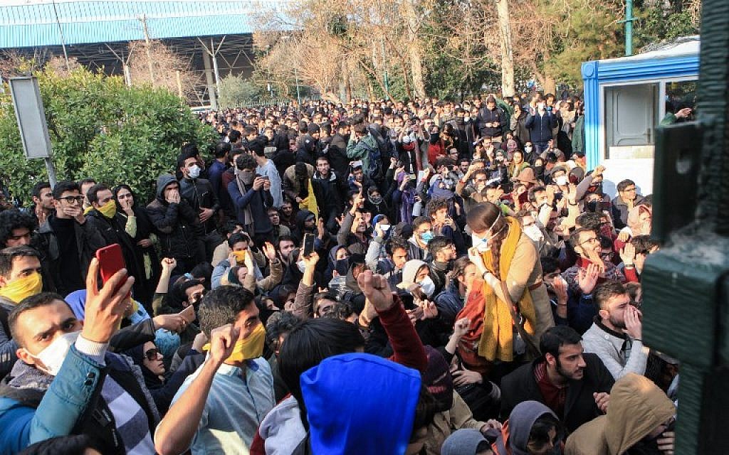 Iranian students protest at the University of Tehran on December 30, 2017.
Students protested in a third day of demonstrations, videos on social media showed, but were outnumbered by counter-demonstrators. (AFP PHOTO / STR)