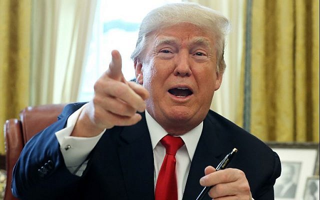 US President Donald Trump talks with journalists after signing tax reform legislation into law in the Oval Office on December 22, 2017. (Chip Somodevilla/Getty Images/AFP) US President Donald Trump talks with journalists after signing tax reform legislation into law in the Oval Office on December 22, 2017. (Chip Somodevilla/Getty Images/AFP)