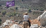 Illustrative: A member of the 'hilltop youth' rides a donkey at an illegal outpost in the northern West Bank. (Credit: Zman Emet, Kan 11)