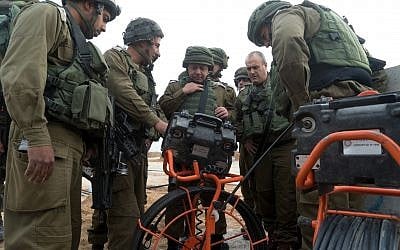 IDF Chief of Staff Gadi Eisenkot, center, visits an attack tunnel dug by a Palestinian terrorist group from the Gaza Strip into southern Israel during a visit to the area on December 20, 2017. (Israel Defense Forces)