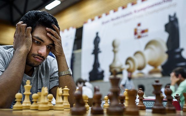 Illustrative: A chess player stares at a board during a competition on July 27, 2017. (schaakbond/Flickr/CC BY 2.0) Illustrative: A chess player stares at a board during a competition on July 27, 2017. (schaakbond/Flickr/CC BY 2.0)