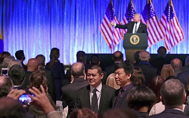 People in the audience have their photo taken as President Donald Trump speaks at a fundraiser at Cipriani in New York, Saturday, Dec. 2, 2017 (AP Photo/Susan Walsh) People in the audience have their photo taken as President Donald Trump speaks at a fundraiser at Cipriani in New York, Saturday, Dec. 2, 2017 (AP Photo/Susan Walsh)