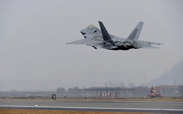 A US Air Force F-22 Raptor takes off from a South Korean air base in Gwangju, South Korea, on December 4, 2017. (Yonhap via AP) A US Air Force F-22 Raptor takes off from a South Korean air base in Gwangju, South Korea, on December 4, 2017. (Yonhap via AP)