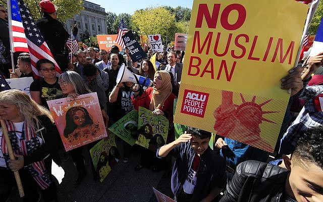 Protesters gather at a rally against the travel ban in Washington, DC, on October 18, 2017. (AP Photo/Manuel Balce Ceneta) Protesters gather at a rally against the travel ban in Washington, DC, on October 18, 2017. (AP Photo/Manuel Balce Ceneta)