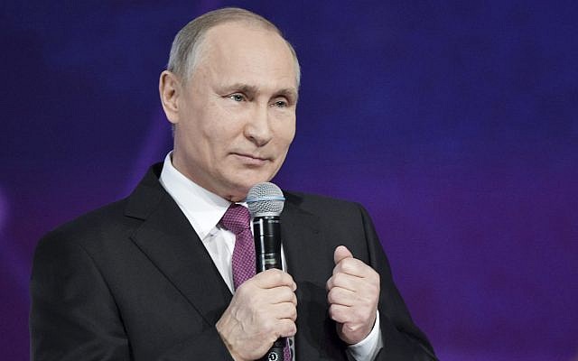 Russian President Vladimir Putin speaks at the annual Volunteer of Russia 2017 award ceremony at the Megasport Sport Palace in Moscow, Russia, December 6, 2017. (Alexei Nikolsky, Sputnik, Kremlin Pool Photo via AP) Russian President Vladimir Putin speaks at the annual Volunteer of Russia 2017 award ceremony at the Megasport Sport Palace in Moscow, Russia, December 6, 2017. (Alexei Nikolsky, Sputnik, Kremlin Pool Photo via AP)
