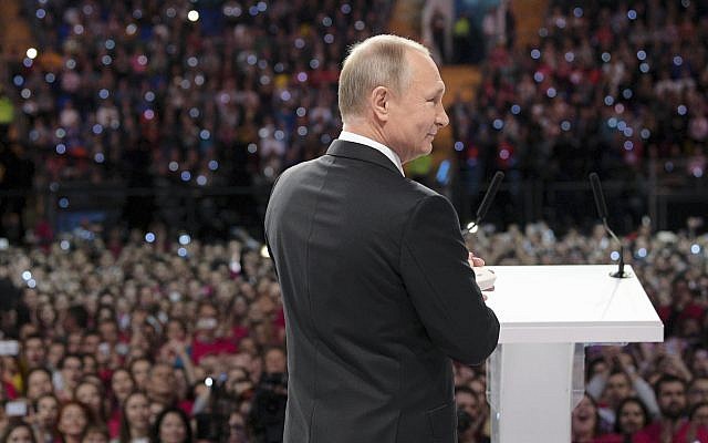 Russian President Vladimir Putin attends the annual Volunteer of Russia 2017 award ceremony at the Megasport Sport Palace in Moscow, Russia, December 6, 2017.(Alexei Druzhinin, Sputnik, Kremlin Pool Photo via AP) Russian President Vladimir Putin attends the annual Volunteer of Russia 2017 award ceremony at the Megasport Sport Palace in Moscow, Russia, December 6, 2017.(Alexei Druzhinin, Sputnik, Kremlin Pool Photo via AP)