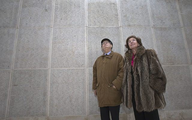 In this photo taken on December 5, 2017, French Nazi hunters Serge Klarsfeld, (l) and his wife Beate look at the Wall of Names at the Shoah Memorial in Paris. (AP Photo/Michel Euler) In this photo taken on December 5, 2017, French Nazi hunters Serge Klarsfeld, (l) and his wife Beate look at the Wall of Names at the Shoah Memorial in Paris. (AP Photo/Michel Euler)
